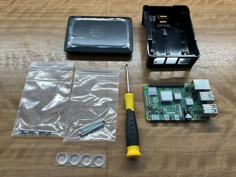 Picture of the Pi case and screws