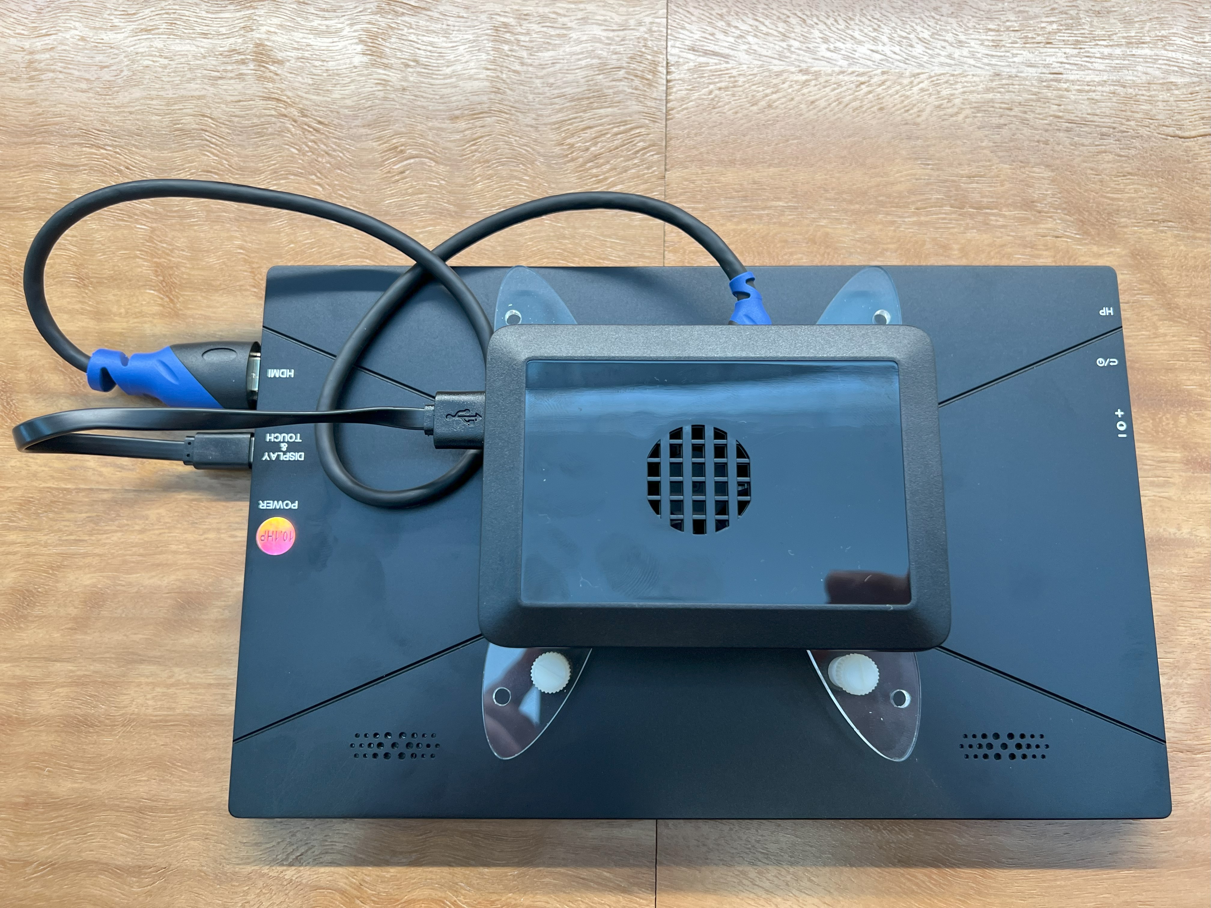 Image Wide Shot showing the USB-C and HDMI cables connected to the Pi and the screen
