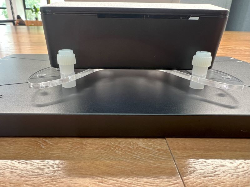 Image showing the VESA mount installed on the case close up, showing how the screws and spaces are installed