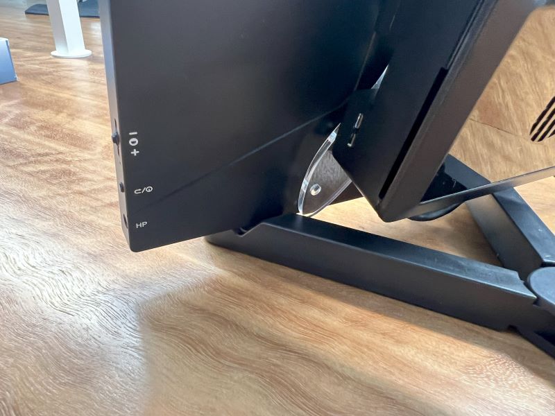 Image showing the side of the stand left with the VESA mount just inside of the stand