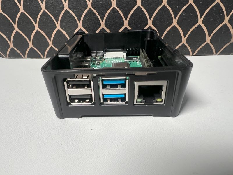 Image showing the side of the pi with LAN and USB ports aligned correctly